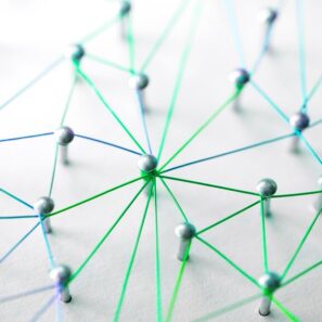 This image shows pins connected by green threads.