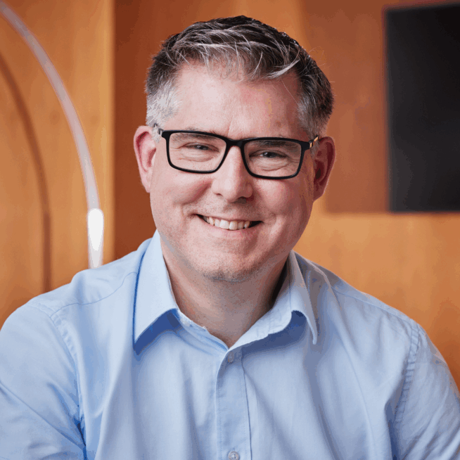 Headshot of Chris Hewson