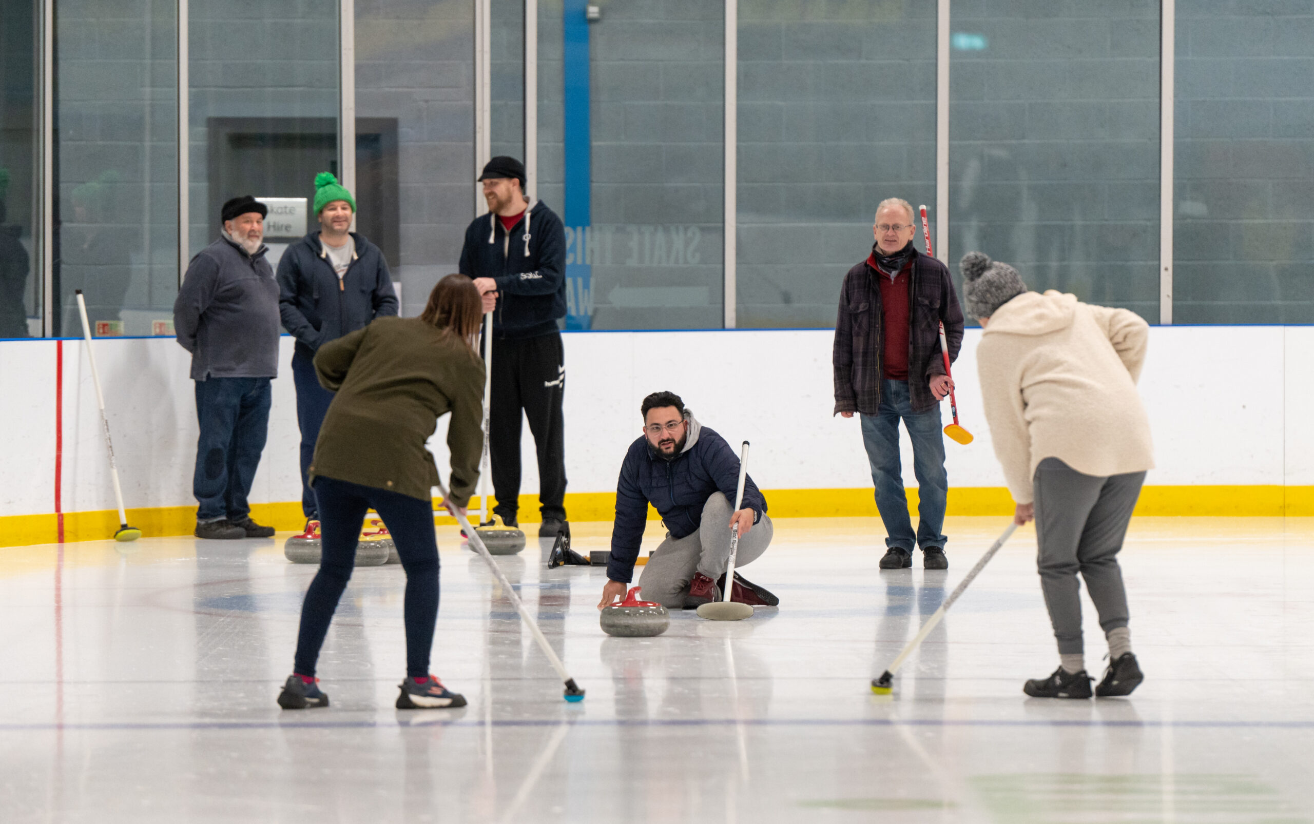 This image shows people curling.