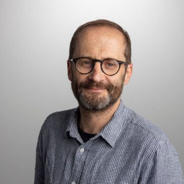 A headshot of Alan Smith, Financial Times.