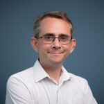 Headshot of Sam Freedman