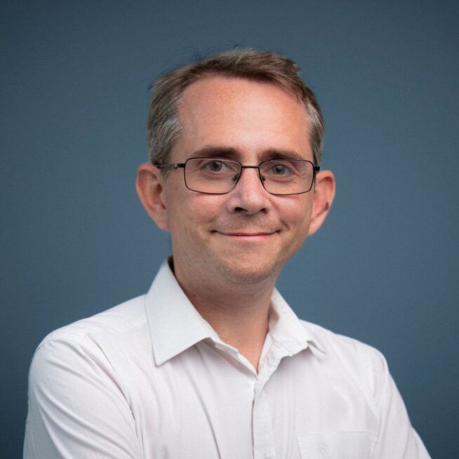 Headshot of Sam Freedman