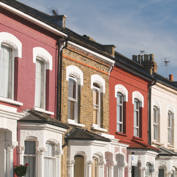 Close up of colourful terraced houses.